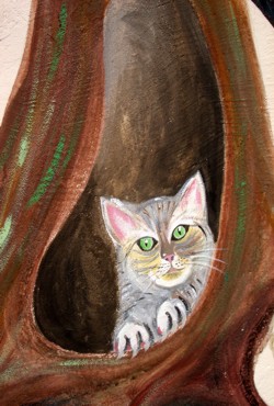 Wandmalerei: Katze in Baumhöhle